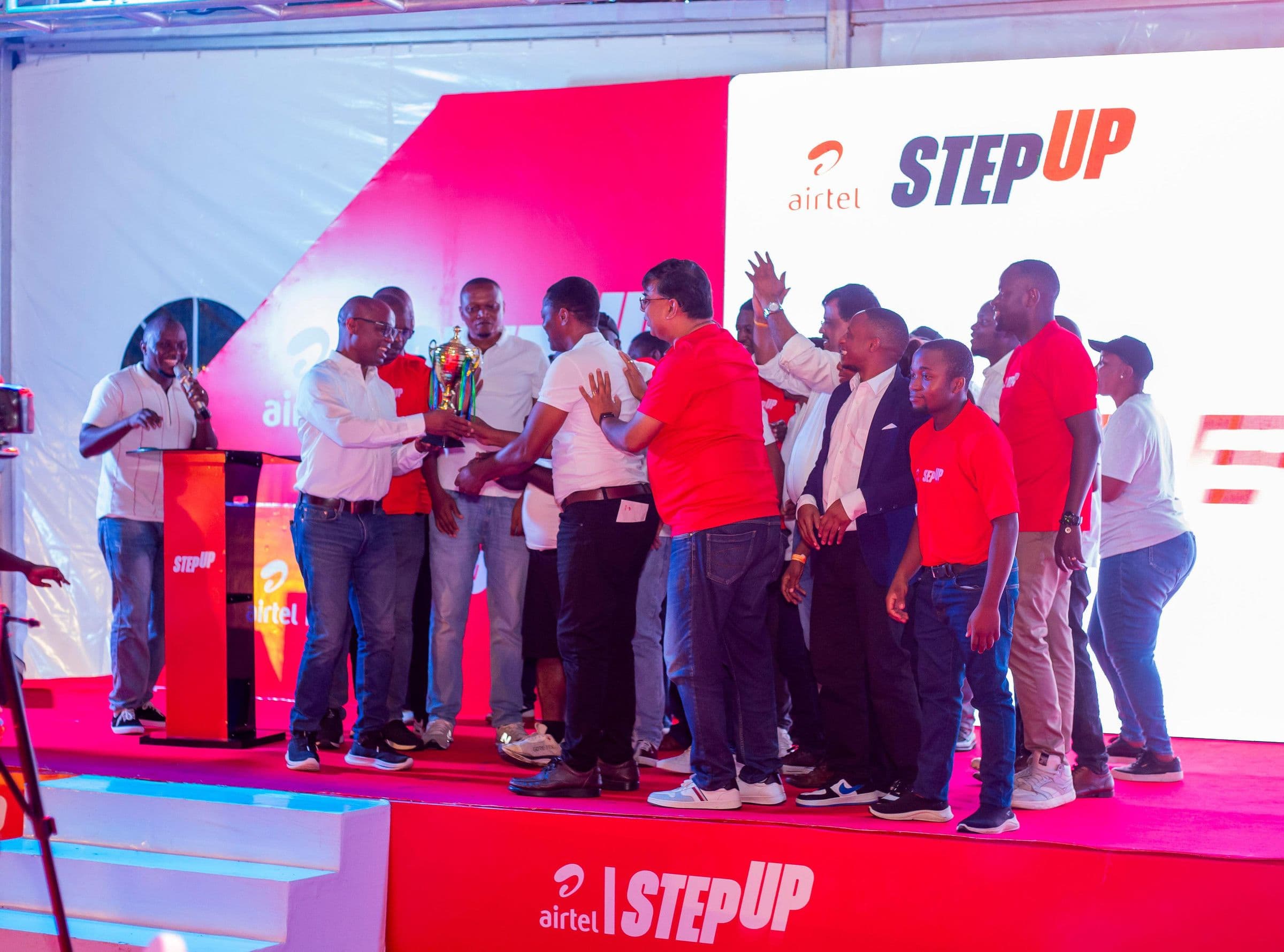 Airtel team members gathered on stage for an awards moment at Airtel StepUp